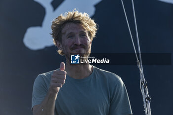 2023-08-22 - Jay Thompson (USA) becomes the first skipper to set a record on the north Atlantic in a Mini 6.50, crossing the line this Monday 21st August 2023 at 4h26 UTC at Lizard Point in 17 days, 9 hours and 43 secondes, before homologation. Here at his arrival on Brest, France on August 22nd 2023 - SAILING - JAY THOMPSON RECORD ON THE NORTH ATLANTIC IN A MINI 6.50 - SAILING - OTHER SPORTS