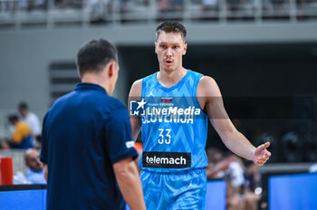 2023-08-04 - 33 GREGOR GLAS with Head Coach ALEKSANDER
SEKULIC of Slovenia during the International Friendly match between Greece and Slovenia at OAKA Stadium on August 4, 2023, in Athens, Greece. - GREECE VS SLOVENIA - FRIENDLY MATCH - BASKETBALL