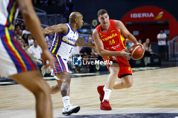2023-08-04 - Joel Parra of Spain and Gregory Vargas of Venezuela during the international basketball friendly match between Spain and Venezuela on August 4, 2023 at Wizink Center pavilion in Madrid, Spain - BASKETBALL - FRIENDLY GAME - SPAIN V VENEZUELA - FRIENDLY MATCH - BASKETBALL