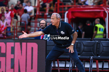 2023-09-17 - Head Coach Ettore Messina of Olimpia Milano during the friendly match between Olympiacos BC and Olimpia Milano after honoring Vassilis Spanoulis at Peace and Friendship Stadium on September 17, 2023, in Athens, Greece. - OLYMPIACOS BC HONORING VASSILIS SPANOULIS, FRIENDLY MATCH OLYMPIACOS VS OLIMPIA MILANO - FRIENDLY MATCH - BASKETBALL