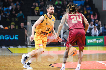 15/03/2023 - 32 JANIS STRELNIEKS of AEK BC during the Round of 16, match between AEK BC and Galatasaray Nef at Ano Liossia Olympic Hall on Wednesday 15 March 2023, in Athens, Greece. - AEK BC VS GALATASARAY NEF - CHAMPIONS LEAGUE - BASKET