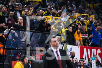 15/03/2023 - AEK BC supporters are having fun during the Round of 16, match between AEK BC and Galatasaray Nef at Ano Liossia Olympic Hall on Wednesday 15 March 2023, in Athens, Greece. - AEK BC VS GALATASARAY NEF - CHAMPIONS LEAGUE - BASKET