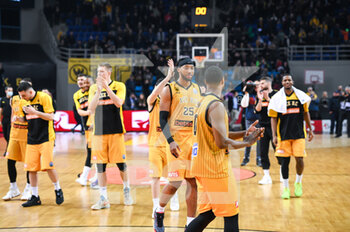 15/03/2023 - Players of AEK BC celebrating the victory during the Round of 16, match between AEK BC and Galatasaray Nef at Ano Liossia Olympic Hall on Wednesday 15 March 2023, in Athens, Greece. - AEK BC VS GALATASARAY NEF - CHAMPIONS LEAGUE - BASKET
