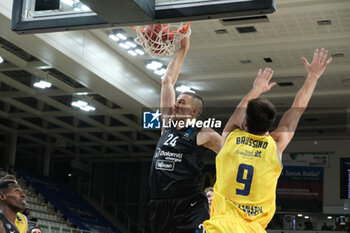 2023-10-18 - Dunk of Andrejs Grazulis of Dolomiti Trentino Energia during the match between Dolomiti Trentino Energia and Dreamland Gran Canaria Club de Baloncesto, regular season of EuroCup BKT 2023/2024 tournament at il T Quotidiano Arena on October 18, 2023, Trento, Italy. - DOLOMITI TRENTINO ENERGIA VS DREAMLAND GRAN CANARIA - EUROCUP - BASKETBALL