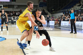 2023-10-18 - Andrejs Grazulis of Dolomiti Trentino Energia in action during the match between Dolomiti Trentino Energia and Dreamland Gran Canaria Club de Baloncesto, regular season of EuroCup BKT 2023/2024 tournament at il T Quotidiano Arena on October 18, 2023, Trento, Italy. - DOLOMITI TRENTINO ENERGIA VS DREAMLAND GRAN CANARIA - EUROCUP - BASKETBALL