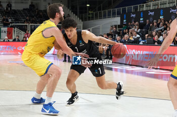 2023-10-18 - Quinn Ellis of Dolomiti Trentino Energia in action during the match between Dolomiti Trentino Energia and Dreamland Gran Canaria Club de Baloncesto, regular season of EuroCup BKT 2023/2024 tournament at il T Quotidiano Arena on October 18, 2023, Trento, Italy. - DOLOMITI TRENTINO ENERGIA VS DREAMLAND GRAN CANARIA - EUROCUP - BASKETBALL