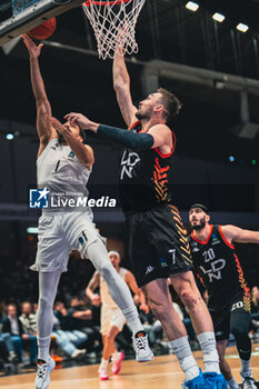 2023-12-26 - Collin MALCOLM (Paris) and Sam DEKKER (London) during the BKT EuroCup basketball match between Paris Basketball and London Lions on December 26, 2023 at Halle Georges Carpentier in Paris, France - BASKETBALL - EUROCUP - PARIS V LONDON LIONS - EUROCUP - BASKETBALL