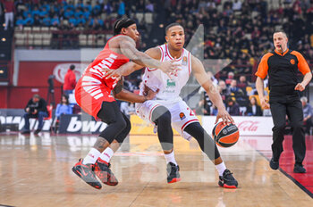 2023-01-06 - 22 DEVON HALL of EA7 Emporio Armani Milan with 3 ISAIAH CANAAN of Olympiacos Piraeus during the Euroleague, Round 17, match between Olympiacos Piraeus and EA7 Emporio Armani Milan at Peace And Friendship Stadium on January 6, 2023 in Athens, Greece. - OLYMPIACOS VS EA7 EMPORIO ARMANI - EUROLEAGUE - BASKETBALL