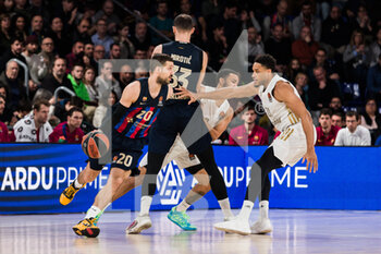 2023-02-02 - Nico Laprovittola of FC Barcelona and Augustine Rubit of FC Bayern Munich during the Turkish Airlines EuroLeague basketball match between FC Barcelona and FC Bayern Munich on February 2, 2023 at Palau Blaugrana in Barcelona, Spain - BASKETBALL - EUROLEAGUE - FC BARCELONA V BAYERN MUNICH - EUROLEAGUE - BASKETBALL