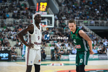 2023-10-12 - 9 Isaac Bonga of FC Bayern Munich with 40 Marius Grigonis of Panathinaikos Athens during the Euroleague, Round 2, match between Panathinaikos Athens and FC Bayern Munich at Oaka Altion on October 12, 2023, in Athens, Greece. - EUROLEAGUE - PANATHINAIKOS BC VS FC BAYERN MUNICH - EUROLEAGUE - BASKETBALL