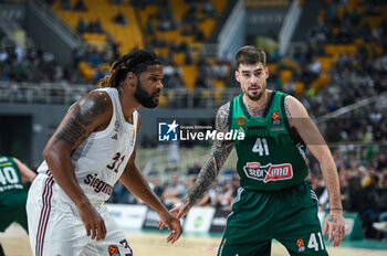 2023-10-12 - 41 Juancho Hernangomez
of Panathinaikos Athens competing with 31 Devin Booker of FC Bayern Munich during the Euroleague, Round 2, match between Panathinaikos Athens and FC Bayern Munich at Oaka Altion on October 12, 2023, in Athens, Greece. - EUROLEAGUE - PANATHINAIKOS BC VS FC BAYERN MUNICH - EUROLEAGUE - BASKETBALL