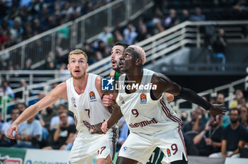 2023-10-12 - 7 Niels Giffey and 9 Isaac Bonga of FC Bayern Munich competing with 21 Ioannis Papapetrou of Panathinaikos Athens during the Euroleague, Round 2, match between Panathinaikos Athens and FC Bayern Munich at Oaka Altion on October 12, 2023, in Athens, Greece. - EUROLEAGUE - PANATHINAIKOS BC VS FC BAYERN MUNICH - EUROLEAGUE - BASKETBALL