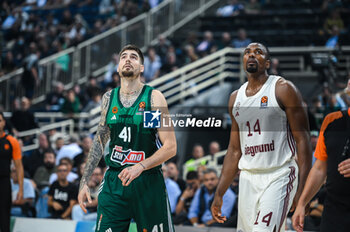 2023-10-12 - 41 Juancho Hernangomez
of Panathinaikos Athens competing with 14 Serge Ibaka of FC Bayern Munich during the Euroleague, Round 2, match between Panathinaikos Athens and FC Bayern Munich at Oaka Altion on October 12, 2023, in Athens, Greece. - EUROLEAGUE - PANATHINAIKOS BC VS FC BAYERN MUNICH - EUROLEAGUE - BASKETBALL