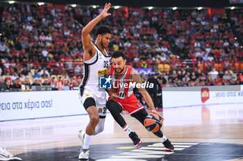 2023-10-19 - 1 Nigel Williams-Goss of Olympiacos Piraeus competing with 35 Perry Dozier Jr. of Partizan during the Euroleague, Round 4, match between Olympiacos Piraeus and Partizan Mozzart Bet Belgrade at Peace & Friendship Stadium on October 19, 2023, in Athens, Greece. - OLYMPIACOS VS PARTIZAN MOZZART BET BELGRADE - EUROLEAGUE - BASKETBALL