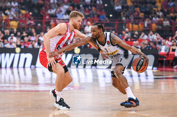 2023-10-19 - 7 Kevin Punter of Partizan Mozzart Bet Belgrade competing with 0 Thomas Walkup of Olympiacos Piraeus during the Euroleague, Round
 4, match between Olympiacos Piraeus and Partizan Mozzart Bet Belgrade at Peace & Friendship Stadium on October 19, 2023, in Athens, Greece - OLYMPIACOS VS PARTIZAN MOZZART BET BELGRADE - EUROLEAGUE - BASKETBALL