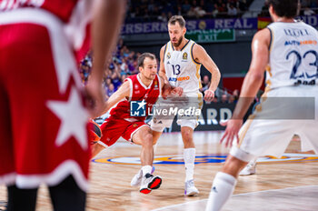 2023-10-19 - Kevin Pangos (EA7 Emporio Armani Olimpia Milano) in action against Sergio Rodriguez (Real Madrid) during the basketball game between Real Madrid and EA7 Emporio Armani Olimpia Milano valid for the round 04 of the Euroleague competition played at Wizink Center in Madrid, Spain on Thursday 19 October 2023 - REAL MADRID VS OLIMPIA MILANO - EUROLEAGUE - BASKETBALL