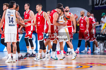 2023-10-19 - Facundo Campazzo (Real Madrid) hugs Giampaolo Ricci (EA7 Emporio Armani Olimpia Milano) at the end of the basketball game between Real Madrid and EA7 Emporio Armani Olimpia Milano valid for the round 04 of the Euroleague competition played at Wizink Center in Madrid, Spain on Thursday 19 October 2023 - REAL MADRID VS OLIMPIA MILANO - EUROLEAGUE - BASKETBALL