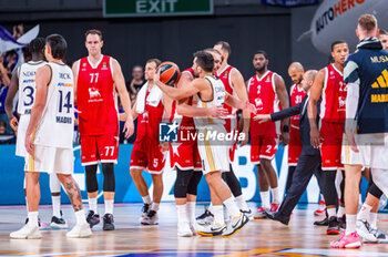 2023-10-19 - Facundo Campazzo (Real Madrid) hugs Stefano Tonut (EA7 Emporio Armani Olimpia Milano) at the end of the basketball game between Real Madrid and EA7 Emporio Armani Olimpia Milano valid for the round 04 of the Euroleague competition played at Wizink Center in Madrid, Spain on Thursday 19 October 2023 - REAL MADRID VS OLIMPIA MILANO - EUROLEAGUE - BASKETBALL