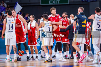 2023-10-19 - Facundo Campazzo (Real Madrid) hugs Nicolo Melli (EA7 Emporio Armani Olimpia Milano) at the end of the basketball game between Real Madrid and EA7 Emporio Armani Olimpia Milano valid for the round 04 of the Euroleague competition played at Wizink Center in Madrid, Spain on Thursday 19 October 2023 - REAL MADRID VS OLIMPIA MILANO - EUROLEAGUE - BASKETBALL