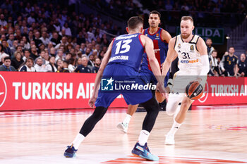 2023-10-26 - Dzanan Musa of Real Madrid and Tomas Satoransky of FC Barcelona during the Turkish Airlines EuroLeague basketball match between Real Madrid and FC Barcelona on October 26, 2023 at Wizink Center in Madrid, Spain - BASKETBALL - EUROLEAGUE - REAL MADRID V FC BARCELONA - EUROLEAGUE - BASKETBALL