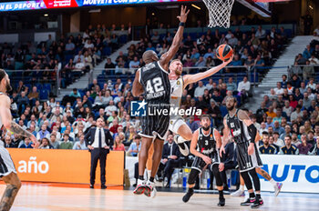 2023-11-09 - Dzanan Musa of Real Madrid (R) and Bryant Dunston of Virtus Bologna (L) seen in action during the Euroleague 2022/23 match between Real Madrid and Virtus Bologna at Wizink Center in Madrid, Spain. - REAL MADRID VS VIRTUS BOLOGNA - EUROLEAGUE - BASKETBALL