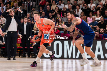 2023-11-17 - Jaime Pradilla of Valencia Basket in action against Willy Hernangomez of Fc Barcelona during the Turkish Airlines EuroLeague basketball match between FC Barcelona and Valencia Basket on November 18, 2023 at Palau Blaugrana in Barcelona, Spain - BASKETBALL - EUROLEAGUE - FC BARCELONA V VALENCIA - EUROLEAGUE - BASKETBALL