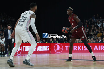 2023-11-23 - Isaac BONGA of Bayern Munich and David LIGHTY of Lyon during the Turkish Airlines EuroLeague basketball match between LDLC Asvel and Bayern Munich on November 23, 2023 at LDLC Arena in Décines-Charpieu near Lyon, France - BASKETBALL - EUROLEAGUE - ASVEL V BAYERN MUNICH - EUROLEAGUE - BASKETBALL