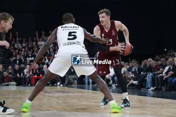 2023-11-23 - Andreas OBST of Bayern Munich and Charles KAHUDI of Lyon during the Turkish Airlines EuroLeague basketball match between LDLC Asvel and Bayern Munich on November 23, 2023 at LDLC Arena in Décines-Charpieu near Lyon, France - BASKETBALL - EUROLEAGUE - ASVEL V BAYERN MUNICH - EUROLEAGUE - BASKETBALL