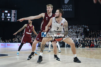 2023-11-23 - Joffrey LAUVERGNE of Lyon and Niels GIFFEY of Bayern Munich during the Turkish Airlines EuroLeague basketball match between LDLC Asvel and Bayern Munich on November 23, 2023 at LDLC Arena in Décines-Charpieu near Lyon, France - BASKETBALL - EUROLEAGUE - ASVEL V BAYERN MUNICH - EUROLEAGUE - BASKETBALL