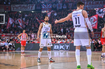 2023-12-05 - 23 Sergio Llull with 11 Mario Hezonja of Real Madrid during the Euroleague, Round 12, match between Olympiacos Piraeus and Real Madrid at Peace and Friendship stadium on December 5, 2023, in Piraeus, Greece. - OLYMPIACOS PIRAEUS VS REAL MADRID - EUROLEAGUE - BASKETBALL