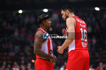 2023-12-08 - 16 Kostas Papanikolaou with 3 Isaiah Canaan of Olympiacos Piraeus during the Euroleague, Round 13, match between Olympiacos Piraeus and FC Bayern Munich at Peace and Friendship stadium on December 8, 2023, in Piraeus, Greece. - OLYMPIACOS PIRAEUS VS FC BAYERN MUNICH - EUROLEAGUE - BASKETBALL