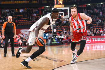 2023-12-08 - 9 Isaac Bonga of FC Bayern Munich during the Euroleague, Round 13, match between Olympiacos Piraeus and FC Bayern Munich at Peace and Friendship stadium on December 8, 2023, in Piraeus, Greece. - OLYMPIACOS PIRAEUS VS FC BAYERN MUNICH - EUROLEAGUE - BASKETBALL