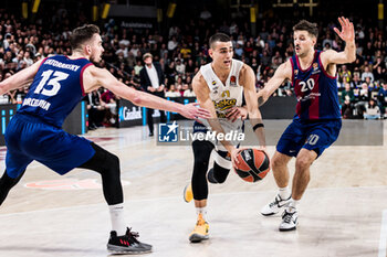 2023-12-08 - Yam Madar of Fenerbahce Beko Istanbul in action against Nico Laprovittola of Fc Barcelona during the Turkish Airlines EuroLeague basketball match between FC Barcelona and Fenerbahce Beko Istanbul on December 8, 2023 at Palau Blaugrana in Barcelona, Spain - BASKETBALL - EUROLEAGUE - FC BARCELONA V FENERBAHCE - EUROLEAGUE - BASKETBALL