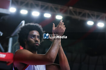 2023-11-02 - Andriu Tomas Woldetensae #8 of Itelyum Varese celebrates the victory at the end of the match during FIBA Europe Cup 2023/24 Regular Season Group I game between Itelyum Varese and BC TSU Tbilisi at Itelyum Arena, Varese, Italy on November 02, 2023 - ITELYUM VARESE V BC TSU TBILISI - FIBA EUROPE CUP - BASKETBALL