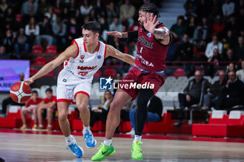 2023-11-08 - Matteo Librizzi #13 of Itelyum Varese competes for the ball against Delano Spencer #1 of Keravnos BC during FIBA Europe Cup 2023/24 Regular Season Group I game between Itelyum Varese and Keravnos BC at Itelyum Arena, Varese, Italy on November 08, 2023 - ITELYUM VARESE V KERAVNOS BC - FIBA EUROPE CUP - BASKETBALL