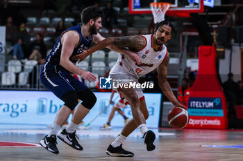 2023-12-13 - Olivier Hanlan #21 of Itelyum Varese (R) competes for the ball against Maarten Bouwknecht #2 of ZZ Leiden (L) during FIBA Europe Cup 2023/24 Second Round Group N game between Itelyum Varese and ZZ Leiden at Itelyum Arena, Varese, Italy on December 13, 2023 - ITELYUM VARESE VS ZZ LEIDEN - FIBA EUROPE CUP - BASKETBALL