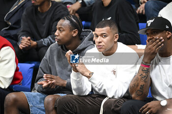 2023-05-16 - Kylian Mbappe during the French championship, Betclic Elite basketball match between Metropolitans 92 (Boulogne-Levallois) and Paris Basketball on May 16, 2023 at Palais des Sports Marcel Cerdan in Levallois, France - BASKETBALL - FRENCH CHAMP - METROPOLITANS V PARIS - FRENCH PRO A - BASKETBALL