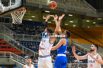 2023-08-09 - 18 MATTEO SPAGNOLO of Italy competing with 26 NEMANJA NEDOVIC of Serbia during the Aegean Acropolis Tournament match between Italy and Serbia at Oaka Stadium on August 9, 2023, in Athens, Greece. - AEGEAN ACROPOLIS TOURNAMENT - SERBIA VS ITALY - INTERNATIONALS - BASKETBALL