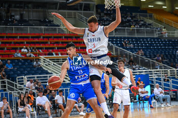 2023-08-09 - 13 SIMONE FONTECCHIO of Italy competing with 5 NIKOLA JOVIC of Serbia during the Aegean Acropolis Tournament match between Italy and Serbia at Oaka Stadium on August 9, 2023, in Athens, Greece. - AEGEAN ACROPOLIS TOURNAMENT - SERBIA VS ITALY - INTERNATIONALS - BASKETBALL