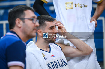 2023-08-09 - 13 OGNJEN DOBRIC of Serbia injured during the Aegean Acropolis Tournament match between Italy and Serbia at Oaka Stadium on August 9, 2023, in Athens, Greece. - AEGEAN ACROPOLIS TOURNAMENT - SERBIA VS ITALY - INTERNATIONALS - BASKETBALL