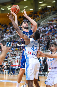 2023-08-08 - 14 DUSAN RISTIC of Serbia competing with 43 THANASSIS ANTETOKOUNMPO of Greece during the Aegean Acropolis Tournament match between Greece and Serbia at Oaka Stadium on August 8, 2023, in Athens, Greece. - AEGEAN ACROPOLIS TOURNAMENT - GREECE VS SERBIA - INTERNATIONALS - BASKETBALL