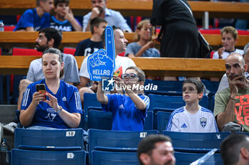2023-08-08 - Greek supporters are having fun during the Aegean Acropolis Tournament match between Greece and Serbia at Oaka Stadium on August 8, 2023, in Athens, Greece. - AEGEAN ACROPOLIS TOURNAMENT - GREECE VS SERBIA - INTERNATIONALS - BASKETBALL