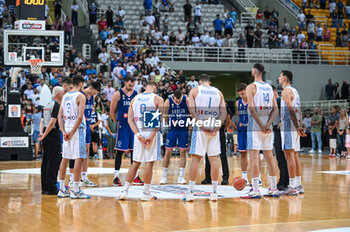 2023-08-08 - A moment of silence for the death of an AEK Athens football team fan during the Aegean Acropolis Tournament match between Greece and Serbia at Oaka Stadium on August 8, 2023, in Athens, Greece. - AEGEAN ACROPOLIS TOURNAMENT - GREECE VS SERBIA - INTERNATIONALS - BASKETBALL