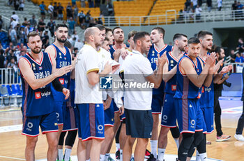 2023-08-08 - Players of Serbia celebrate the victory during the Aegean Acropolis Tournament match between Greece and Serbia at Oaka Stadium on August 8, 2023, in Athens, Greece. - AEGEAN ACROPOLIS TOURNAMENT - GREECE VS SERBIA - INTERNATIONALS - BASKETBALL