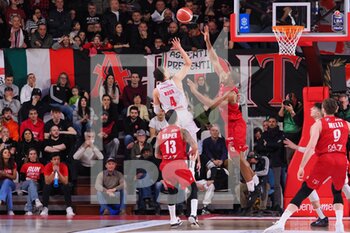 2023-02-12 - Colbey Ross (Pallacanestro Openjobmetis Varese) thwarted by Kyle Hines (EA7 Emporio Armani Olimpia Milano)  - OPENJOBMETIS VARESE VS EA7 EMPORIO ARMANI MILANO - ITALIAN SERIE A - BASKETBALL