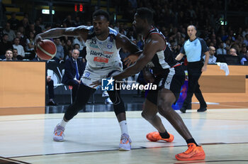 2023-05-13 - Nick Perkins (Happy Casa Brindisi) thwarted by Mouhammadou Jaiteh (Segafredo Virtus Bologna) during game 1 of the playoff quarter-finals of the Italian A1 basketball championship match Segafredo Virtus Bologna Vs. Happy Casa Brindisi - Bologna, Italy, May 13, 2023 at Segafredo Arena - Photo: Michele Nucci - PLAYOFF - VIRTUS BOLOGNA VS NEW BASKET BRINDISI - ITALIAN SERIE A - BASKETBALL