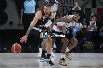 2023-05-13 - Isaia Cordinier (Segafredo Virtus Bologna) thwarted by Marcquise Reed (Happy Casa Brindisi) during game 1 of the playoff quarter-finals of the Italian A1 basketball championship match Segafredo Virtus Bologna Vs. Happy Casa Brindisi - Bologna, Italy, May 13, 2023 at Segafredo Arena - Photo: Michele Nucci - PLAYOFF - VIRTUS BOLOGNA VS NEW BASKET BRINDISI - ITALIAN SERIE A - BASKETBALL