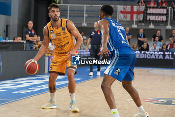 2023-10-01 - Matteo Tambone of Carpegna Prosciutto Pesaro play the ball during the match between Germani Basket Brescia and Carpegna Prosciutto Pesaro, regular season of A1 Italian Basketball Championship 2023/2024 at PalaLeonessa A2A on October 1, 2023, Brixia, Italy. - GERMANI BRESCIA VS CARPEGNA PROSCIUTTO PESARO - ITALIAN SERIE A - BASKETBALL