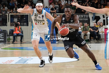 2023-09-30 - Paul Biligha of Dolomiti Trentino Energia afterwards by Grant Golden of Vanoli Basket Cremona during the match between Dolomiti Trentino Energia and Vanoli Basket Cremona, regular season of A1 Italian Basketball Championship 2023/2024 at il T Quotidiano Arena Palace on September 30, 2023, Trento, Italy. - DOLOMITI ENERGIA TRENTINO VS VANOLI BASKET CREMONA - ITALIAN SERIE A - BASKETBALL