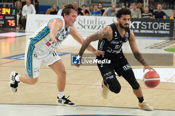 2023-09-30 - Prentiss Hubb of Dolomiti Trentino Energia afterwards by Davide Denegri of Vanoli Basket Cremona during the match between Dolomiti Trentino Energia and Vanoli Basket Cremona, regular season of A1 Italian Basketball Championship 2023/2024 at il T Quotidiano Arena Palace on September 30, 2023, Trento, Italy. - DOLOMITI ENERGIA TRENTINO VS VANOLI BASKET CREMONA - ITALIAN SERIE A - BASKETBALL